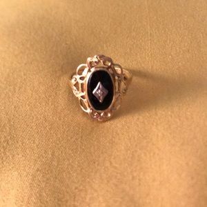 Size 9 10k Gold and Onyx ring.